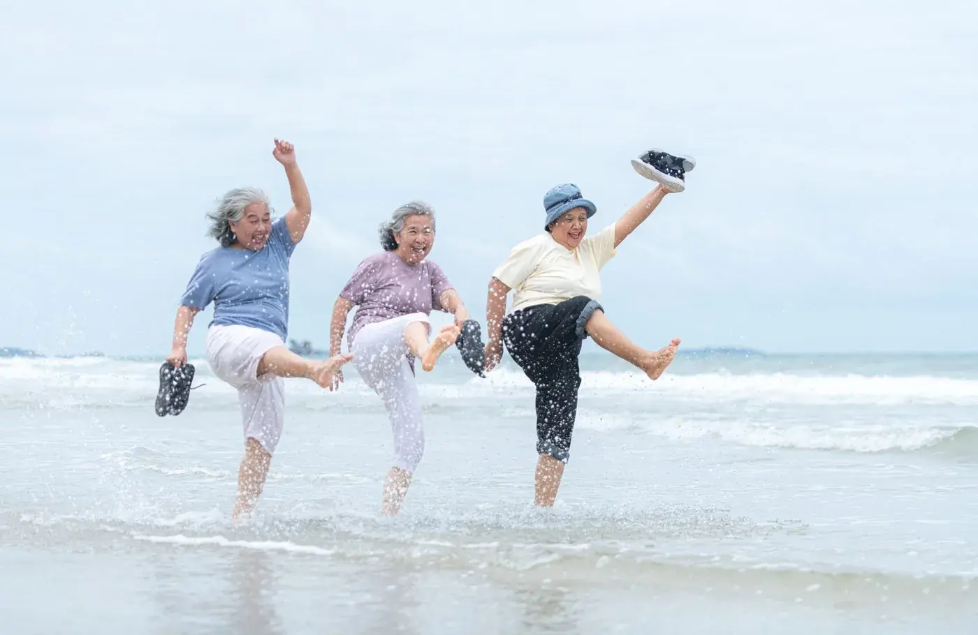 Group of friends jumping in celebration